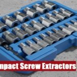 A robust impact screw extractor set case lying on a concrete surface for heavy duty fastener removal.