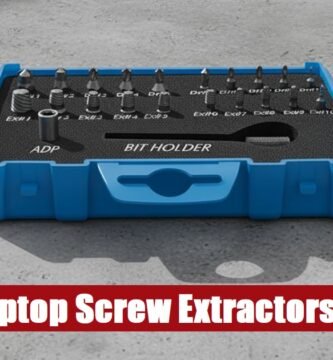 Professional laptop screw extractor kit lying on a cement background for precision computer maintenance.