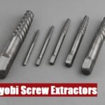 A reliable Ryobi screw extractor set inside a toolbox lying on cement, ready for fastener removal projects.