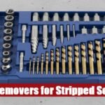 Heavy duty stripped screw remover kit case lying on a grey cement floor for tough renovation projects.