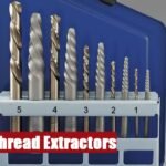 A professional thread extractor set box lying on a grey cement floor for heavy duty industrial work.